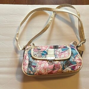 Treviso-floral hand bag with Adjustable strap. Never used dead stock.purse